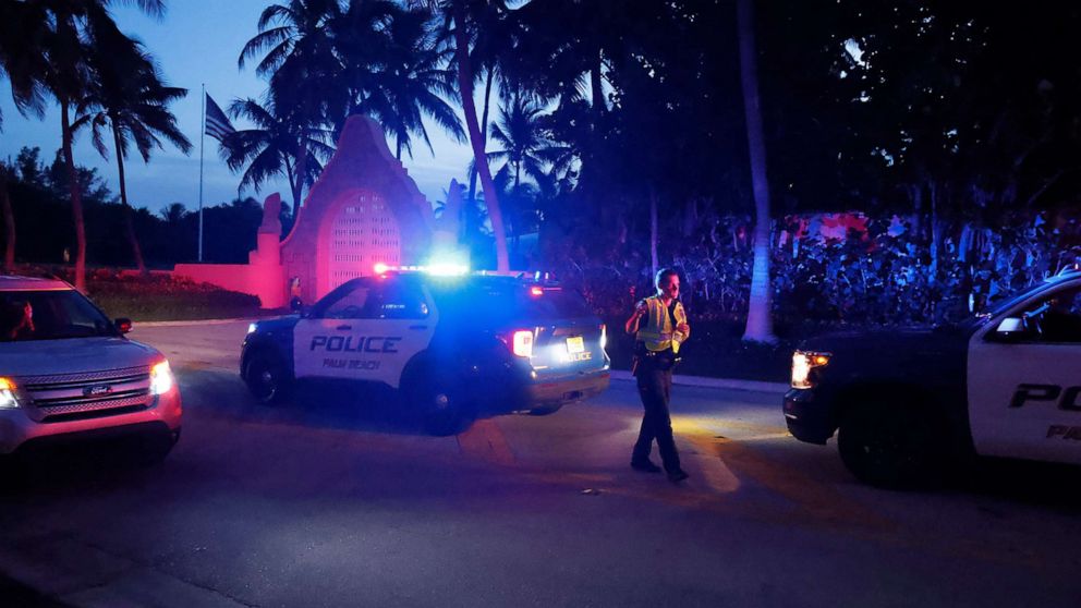 PHOTO: Police direct traffic outside an entrance to former President Donald Trump's Mar-a-Lago estate, Aug. 8, 2022, in Palm Beach, Fla