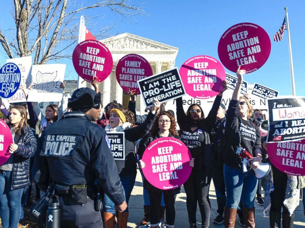 PHOTO: Abortion rights and anti-abortion rights advocates protest in front of the U.S. Supreme Court during the 2018 March for Life on Jan. 19, 2018, in Washington, D.C.