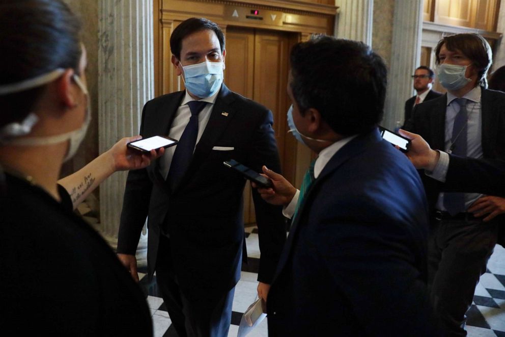 PHOTO: Sen. Marco Rubio, R-Fla., speaks to members of the press as he arrives for a vote at the U.S. Capitol, May 14, 2020 in Washington, D.C. 