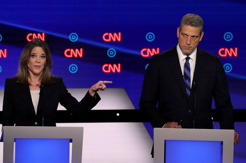 PHOTO: Democratic presidential candidate Marianne Williamson speaks while Rep. Tim Ryan (D-OH) listens during the Democratic Presidential Debate at the Fox Theatre July 30, 2019 in Detroit, Michigan.