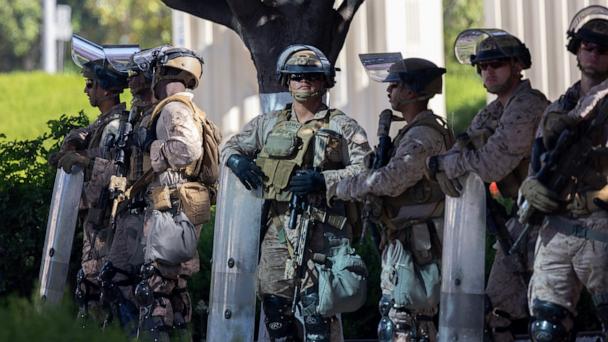 Marines from the Marine Corps Air Ground Combat Center (MCAGCC) at Twentynine Palms guard the Wilshire Federal Building as people protest the involvement of the U.S. in Israel's war against Iran, June 22, 2025, in Los Angeles.