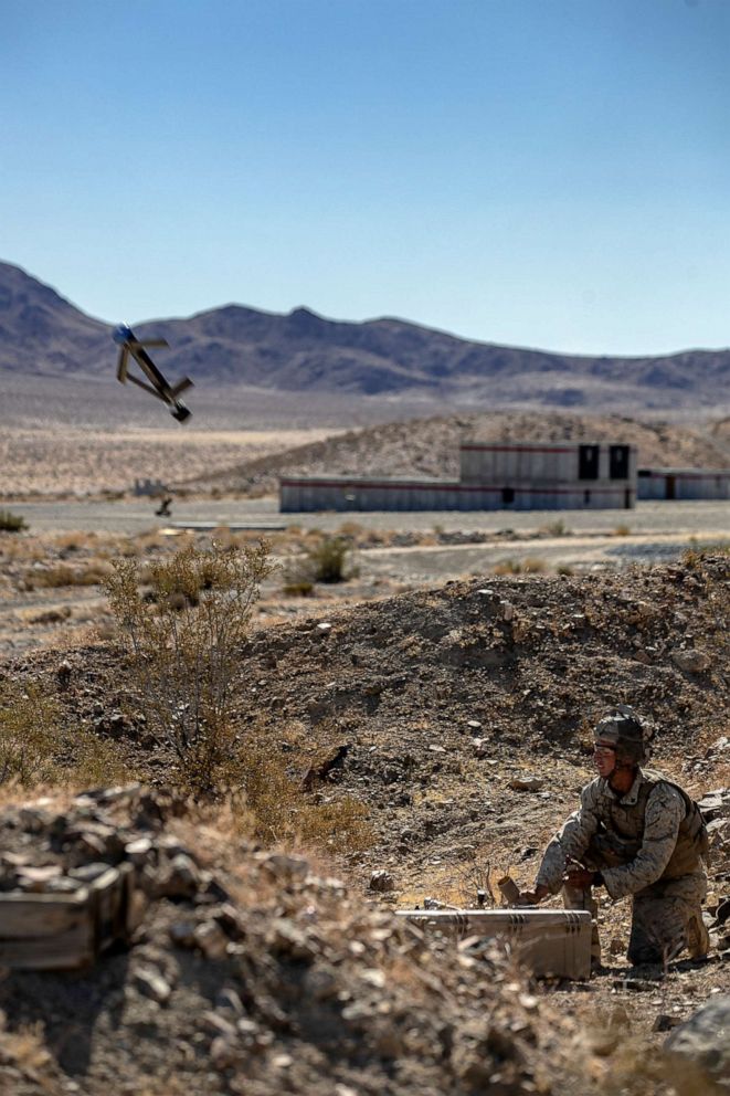 PHOTO: U.S. Marine Corps Cpl. Graham Rouse launches the Switchblade 300 1-20 on Marine Corps Air Ground Combat Center, Twentynine Palms, Calif., Oct. 23, 2019.