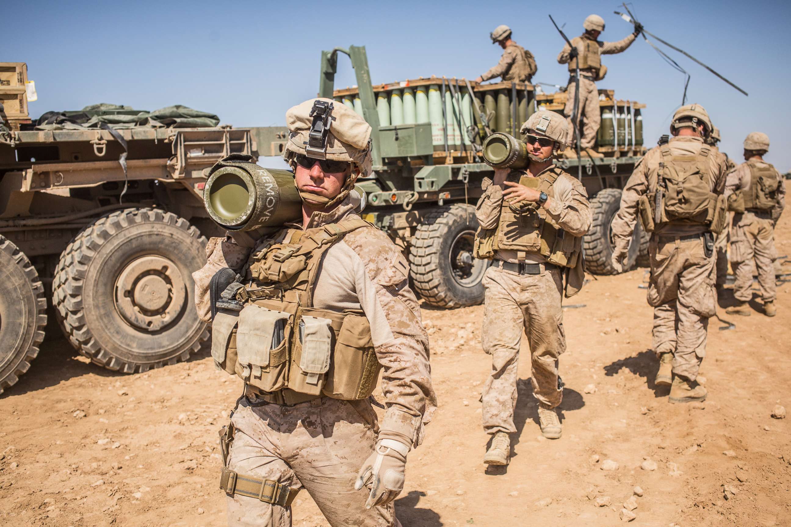 PHOTO: U.S. Marines with the 11th Marine Expeditionary Unit carry rounds to an M777 Howitzer gun line in preparation for fire missions in northern Syria as part of Combined Joint Task Force - Operation Inherent Resolve, Mar. 21, 2017.