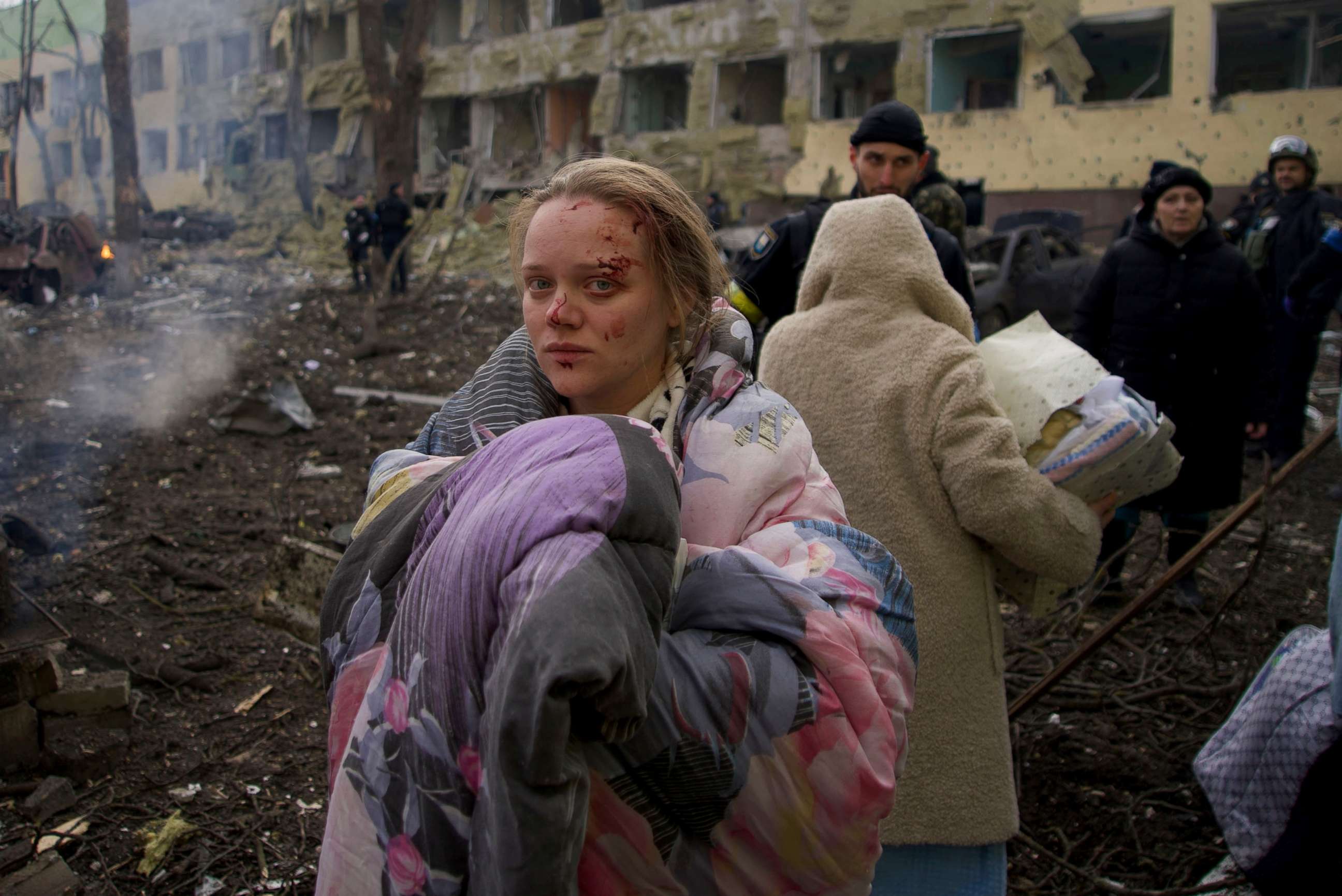 PHOTO: Marianna Vishegirskaya stands outside a maternity hospital that was damaged by shelling in Mariupol, Ukraine, March 9, 2022.