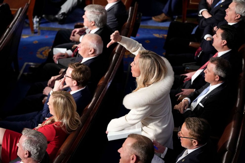 PHOTO: Rep. Marjorie Taylor Greene, R-Ga., reacts as President Joe Biden delivers the State of the Union address to a joint session of Congress at the U.S. Capitol, Tuesday, Feb. 7, 2023, in Washington.