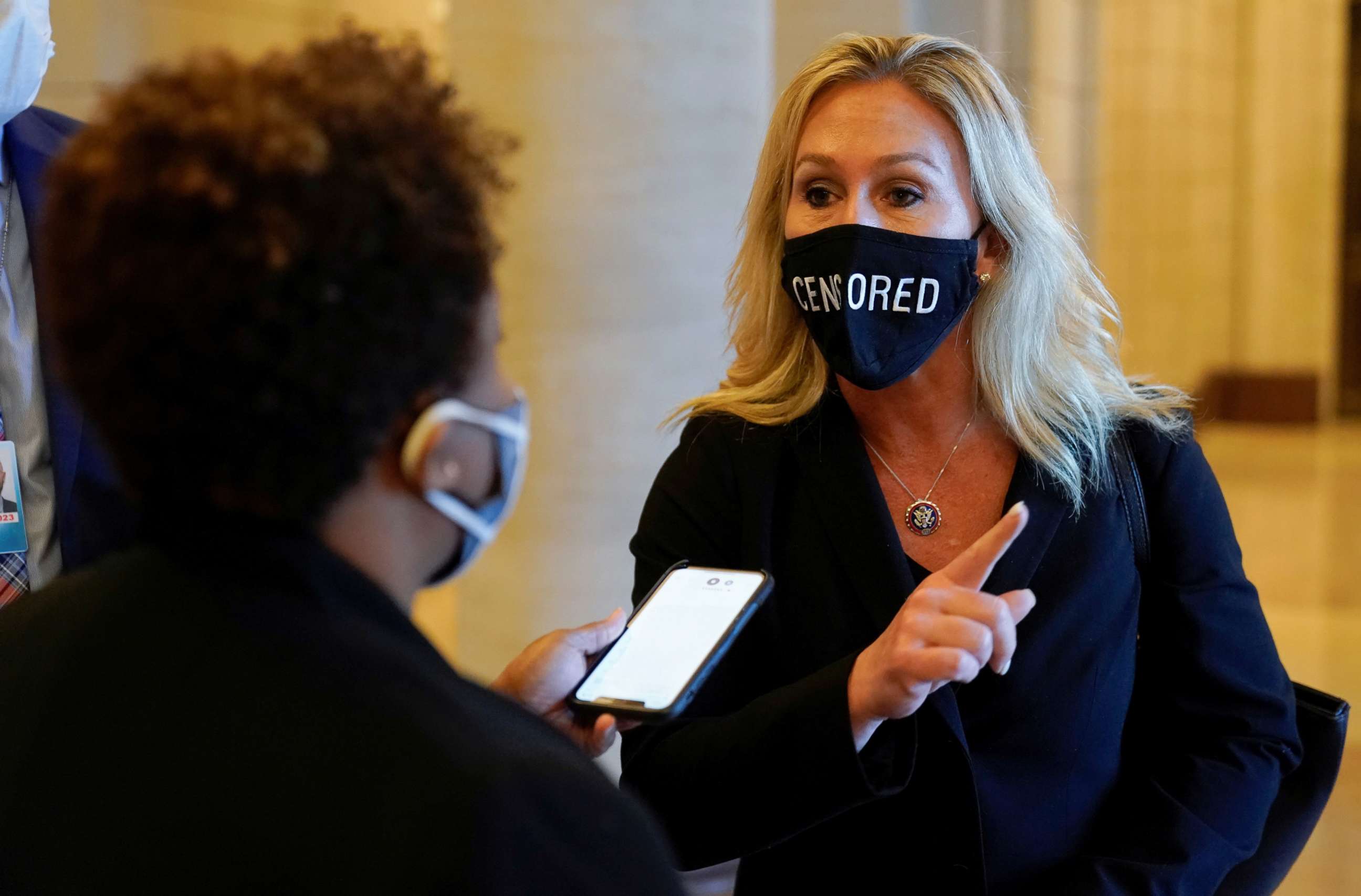 PHOTO: Rep. Marjorie Taylor Greene walks through the U.S. Capitol in Washington, Jan. 13, 2021.