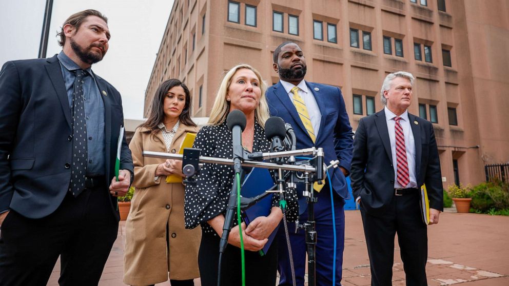 PHOTO: Rep. Marjorie Taylor Greene talks to the media along with Rep. Anna Paulina Luna, Rep. Byron Donalds, and Rep. Mike Collins at the DC Department of Corrections on March 24, 2023, in Washington, D.C.