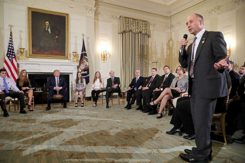 PHOTO: Mark Barden, right, founder and managing director of Sandy Hook Promise, speaks during a listening session hosted by President Trump with survivors of school shootings, their parents and teachers at the White House Feb. 21, 2018.