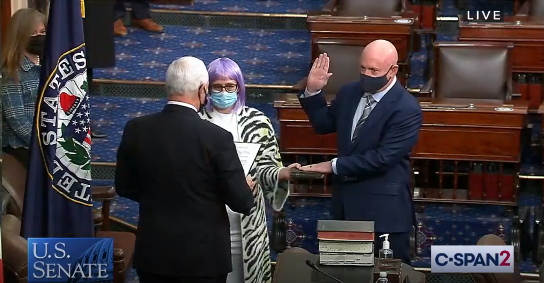 PHOTO: Mark Kelly is sworn in as Arizona's newest senator by Vice-President Mike Pence while standing next former Arizona congresswoman Gabrielle Giffords on the Senate floor in Washington, Dec. 2, 2020.