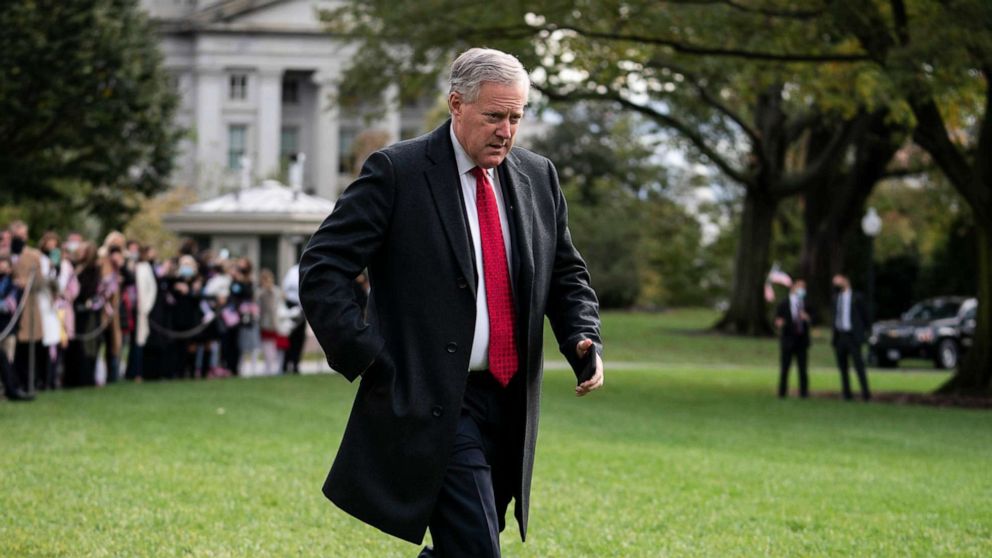PHOTO: White House Chief of Staff Mark Meadows walks along the South Lawn before President Donald Trump departs from the White House on Oct. 30, 2020, in Washington.