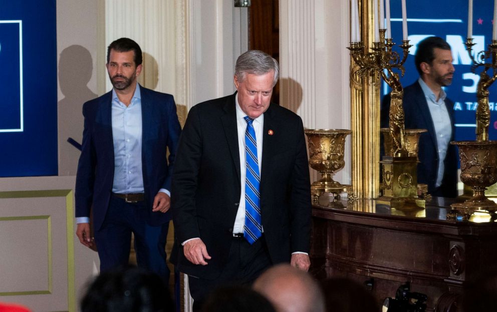 PHOTO: White House Chief of Staff Mark Meadows and Donald Trump Jr. arrive ahead of President Donald Trump in the the East Room of the White House in Washington, Wednesday, Nov, 4, 2020.