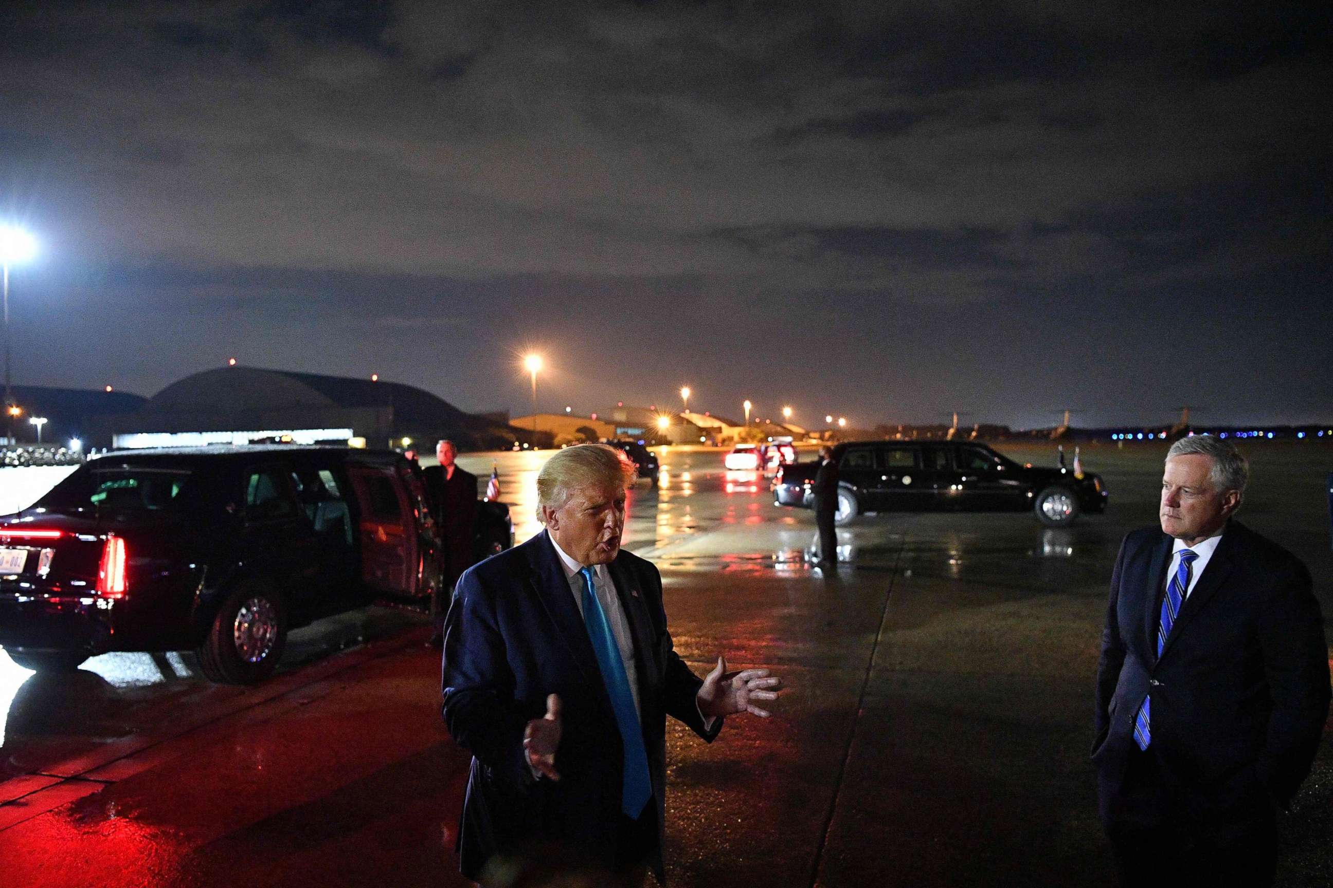 PHOTO: President Donald Trump, next to White House chief of staff Mark Meadows, speaks to reporters upon arrival at Andrews Air Force Base in Maryland on Sept. 3, 2020.
