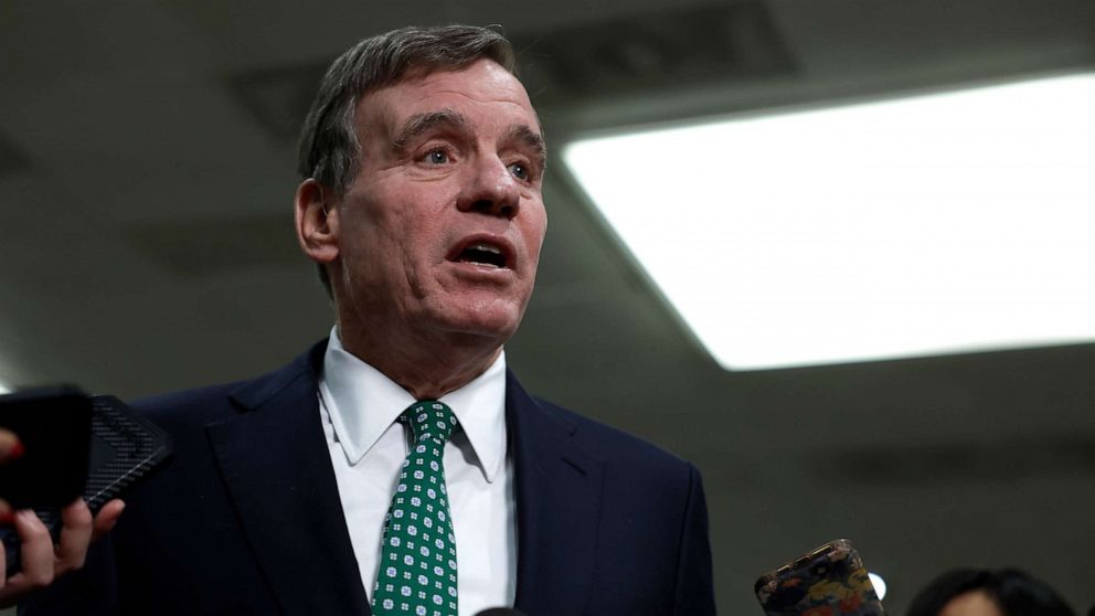 PHOTO: Sen. Mark Warner speaks with reporters after attending a closed-door, classified briefing for Senators at U.S. Capitol Building on Feb. 14, 2023, in Washington, D.C.