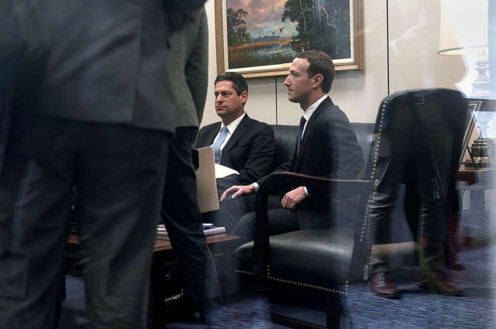 PHOTO: Facebook CEO Mark Zuckerberg, right, waits by the front desk for a meeting with Sen. Bill Nelson, ranking member of the Senate Committee on Commerce, Science, and Transportation, April 9, 2018 on Capitol Hill in Washington, D.C.