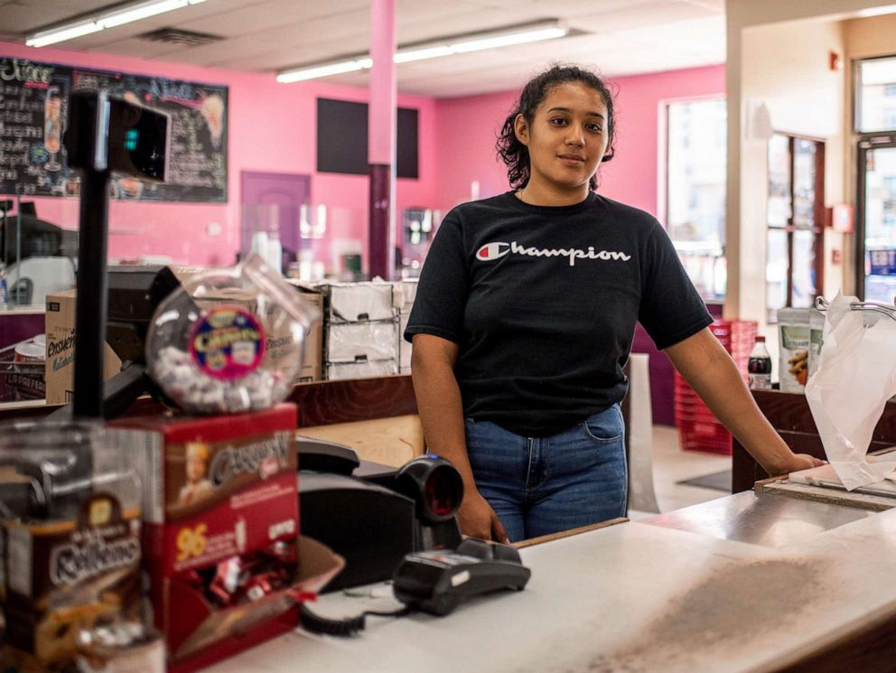 PHOTO: America Zaragroa poses for a portrait inside Zamora Fresh Market in Marshalltown, Iowa, Aug. 7, 2019, which has a growning Hispanic and Latino community.