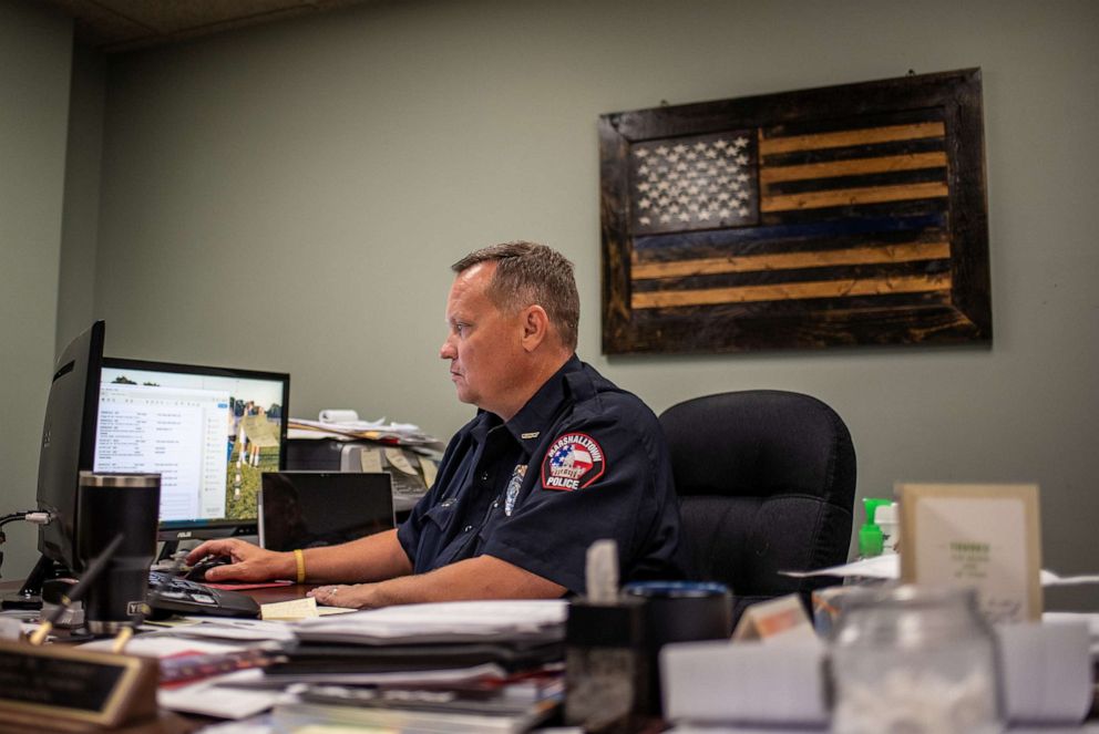 PHOTO: Police Chief Micheal Tupper works in his office at the Marshalltown Police Department in Marshalltown, Iowa, Aug. 7, 2019.