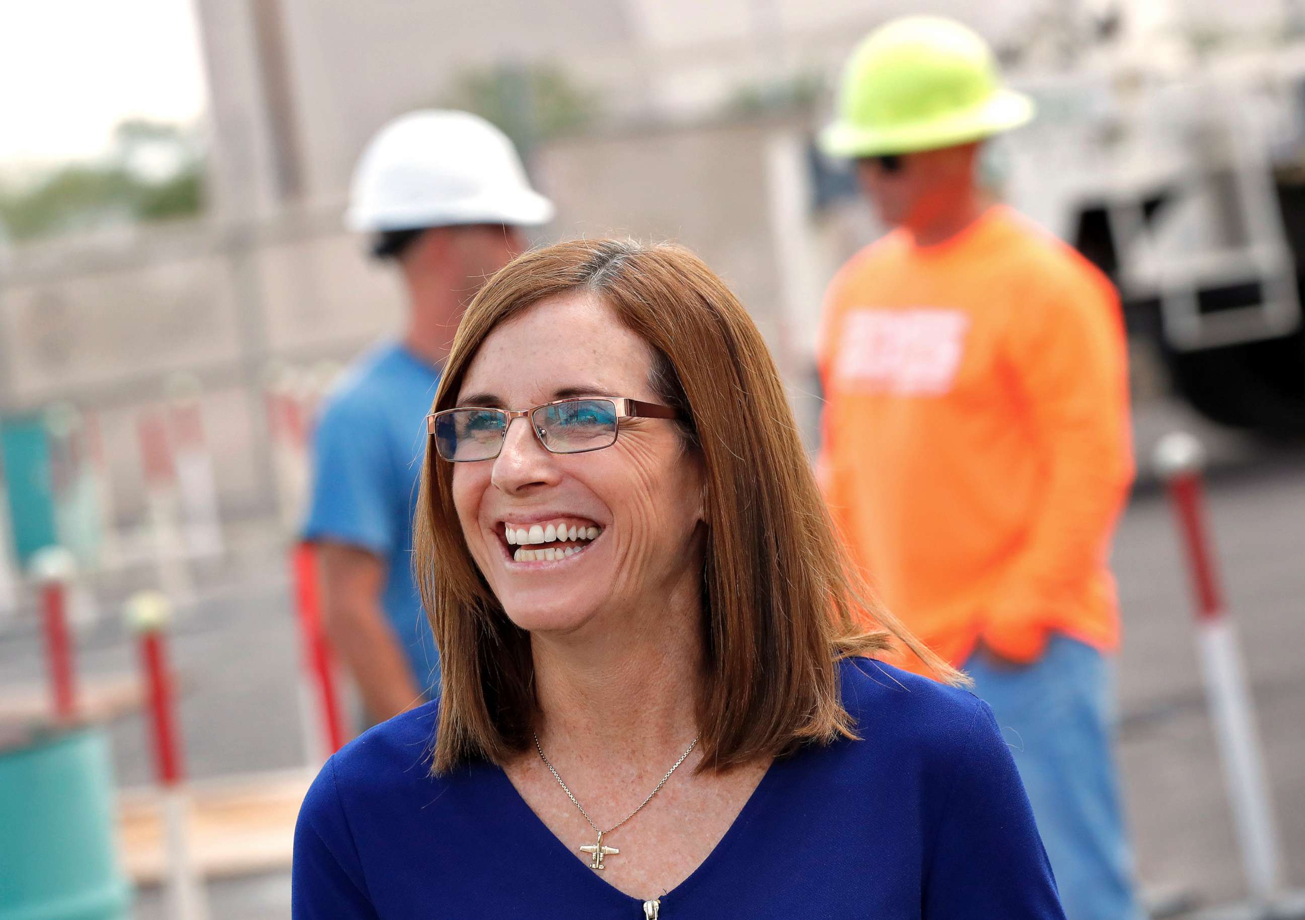 PHOTO: U.S. Rep. Martha McSally talks to tours at a crane manufacturing and training facility, , Oct. 3, 2018, in Phoenix. 