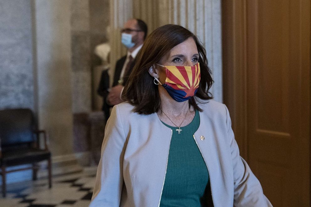 PHOTO: Senator Martha McSally, a Republican from Arizona, wears a protective mask as she leaves the Senate Floor at the U.S. Capitol in Washington, D.C., Sept. 9, 2020.