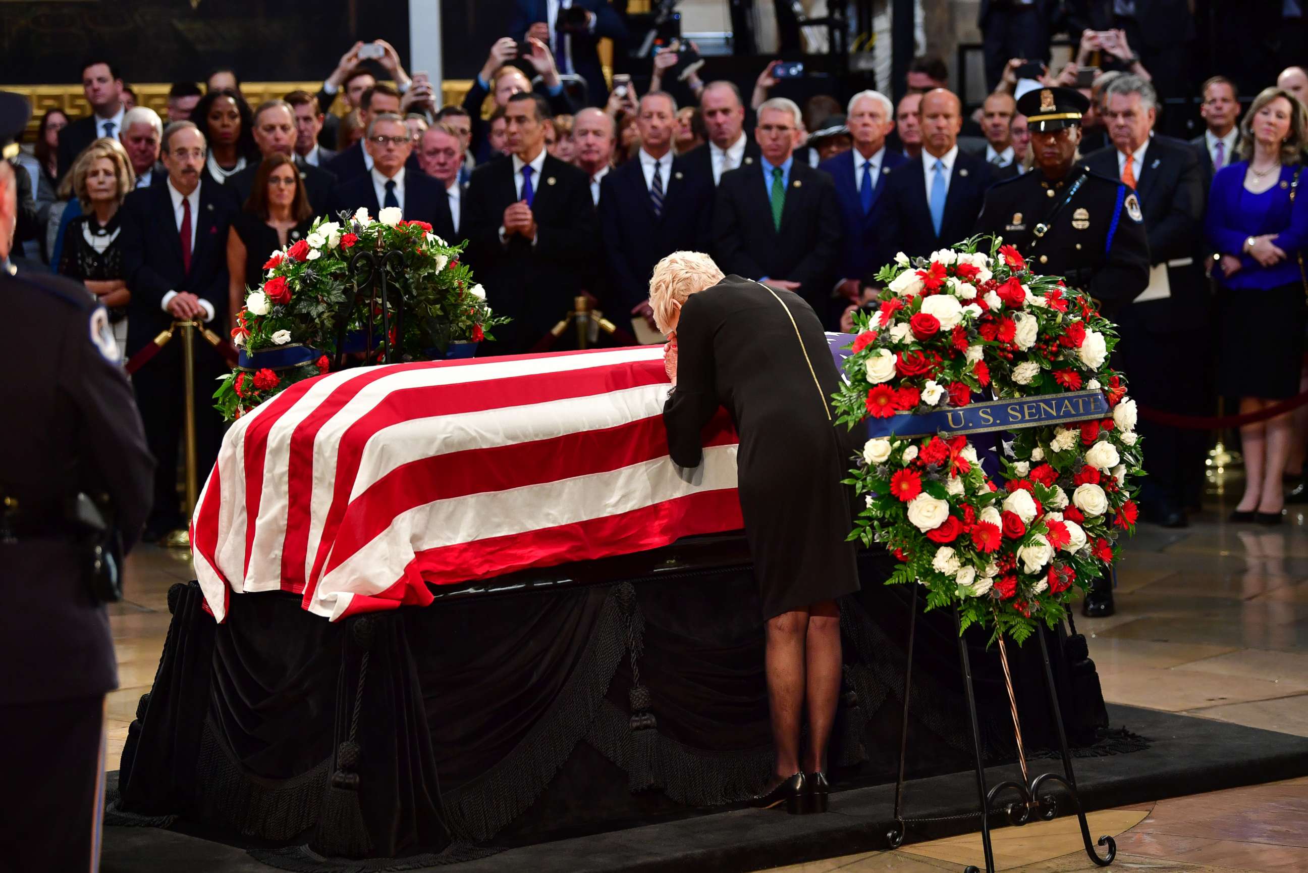 PHOTO: Rep. Martha McSally stands in the crowd as Cindy McCain, wife of late Sen. John McCain, pays respects at her husband's casket inside the U.S. Capitol Rotunda in Washington, Aug. 31, 2018.