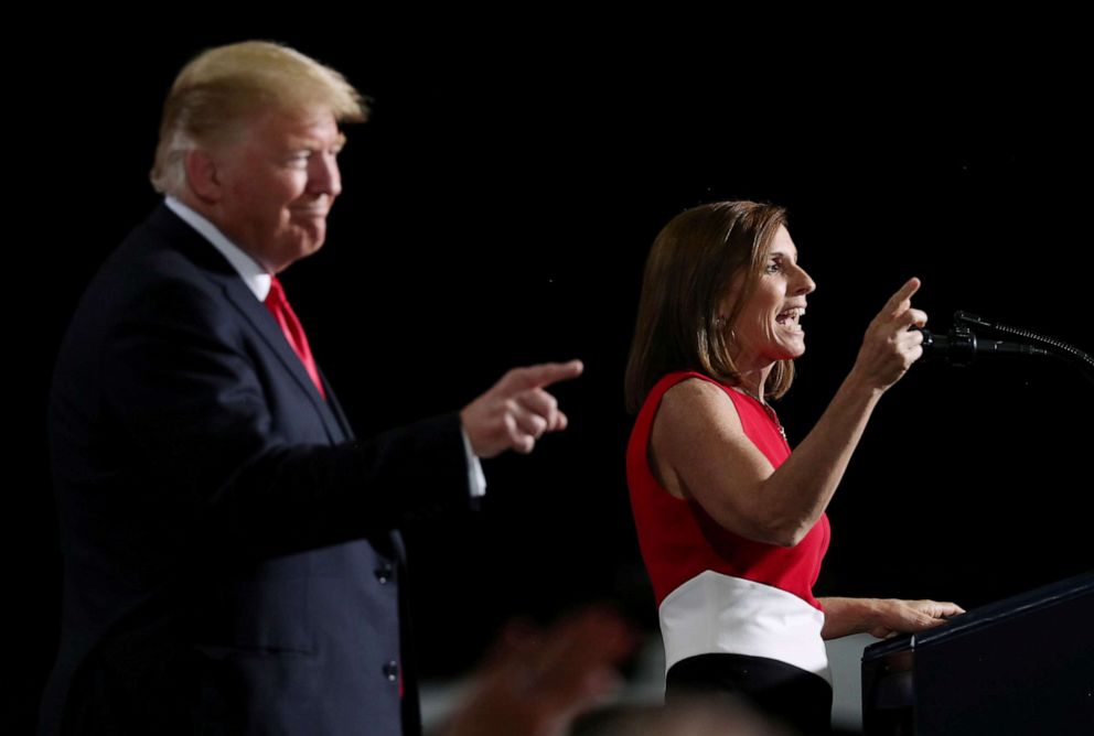 PHOTO: President Donald Trump and Senate candidate Martha McSally rally with supporters at Phoenix-Mesa Gateway Airport in Mesa, Ariz., Oct. 19, 2018.