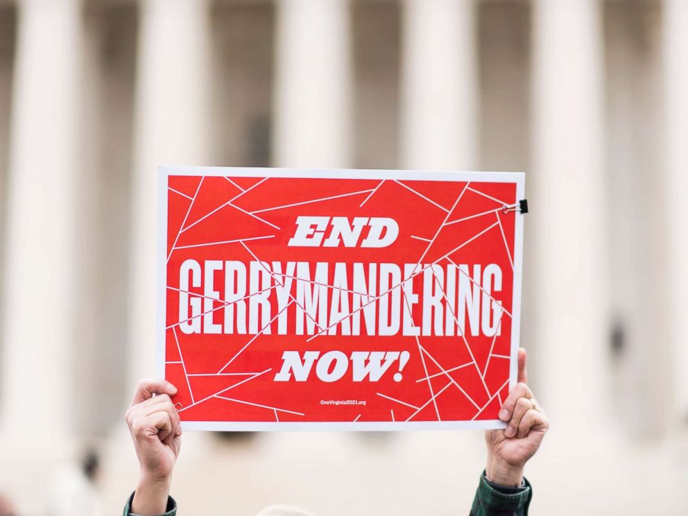 PHOTO: Gerrymandering activists gather on the steps of the Supreme Court as the court prepares to hear the the Benisek v. Lamone case on Wednesday, March 28, 2018.