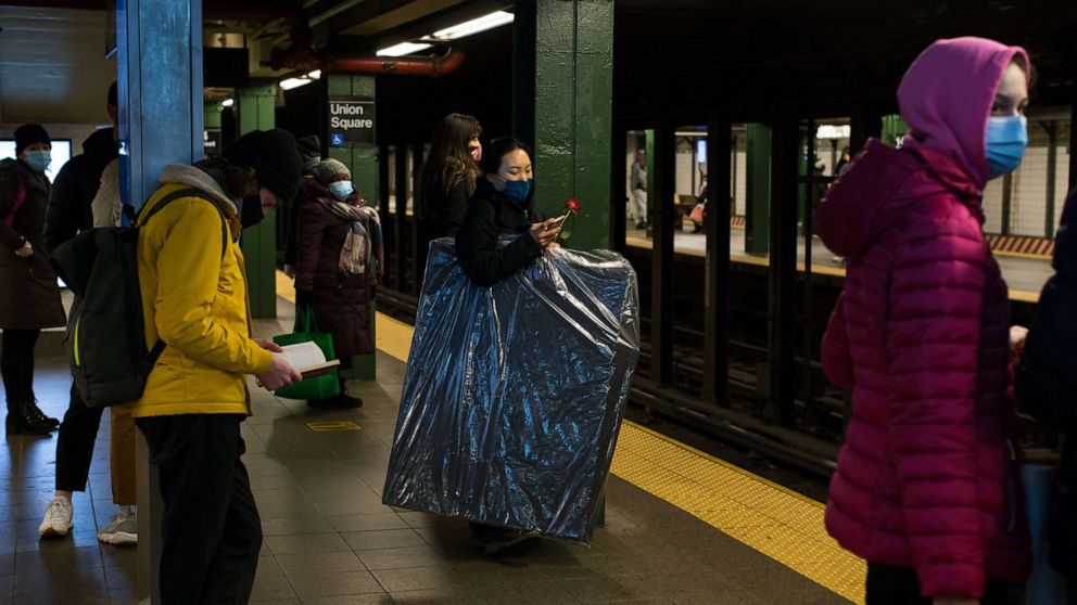 PHOTO: In this Feb. 14, 2021, file photo, passengers wait in a Union Square subway station in New York.