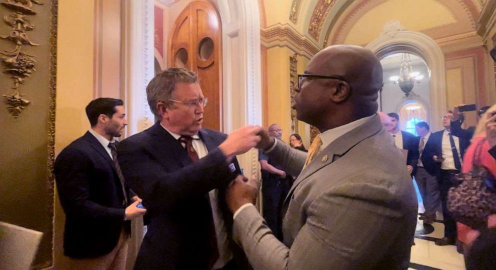 PHOTO: Reps. Thomas Massie, R-Ky., and Jamaal Bowman, D-N.Y., have a shouting match over gun violence outside the House chamber, March 29, 2023.