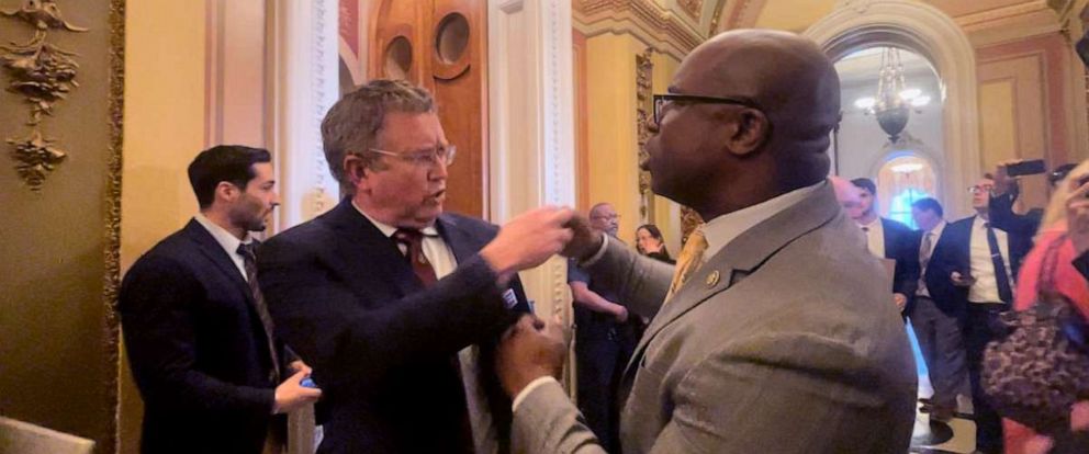 PHOTO: Reps. Thomas Massie, R-Ky., and Jamaal Bowman, D-N.Y., have a shouting match over gun violence outside the House chamber on Wednesday.