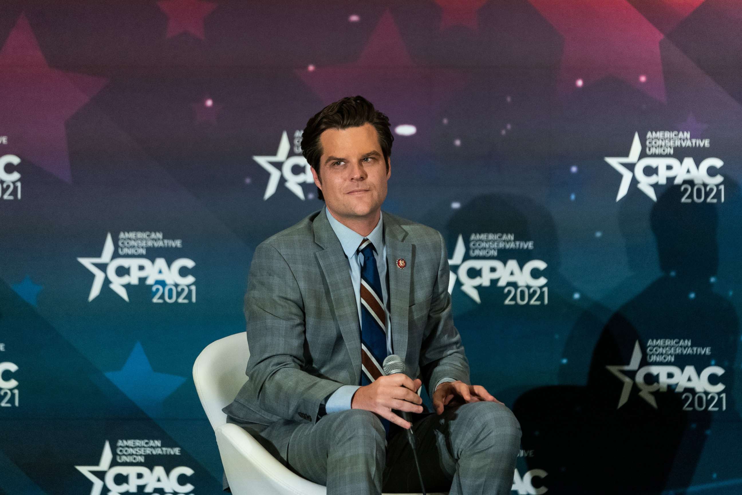 PHOTO: Rep. Matt Gaetz listens during a panel at the Conservative Political Action Conference (CPAC) in Orlando, Fla., Feb. 27, 2021.