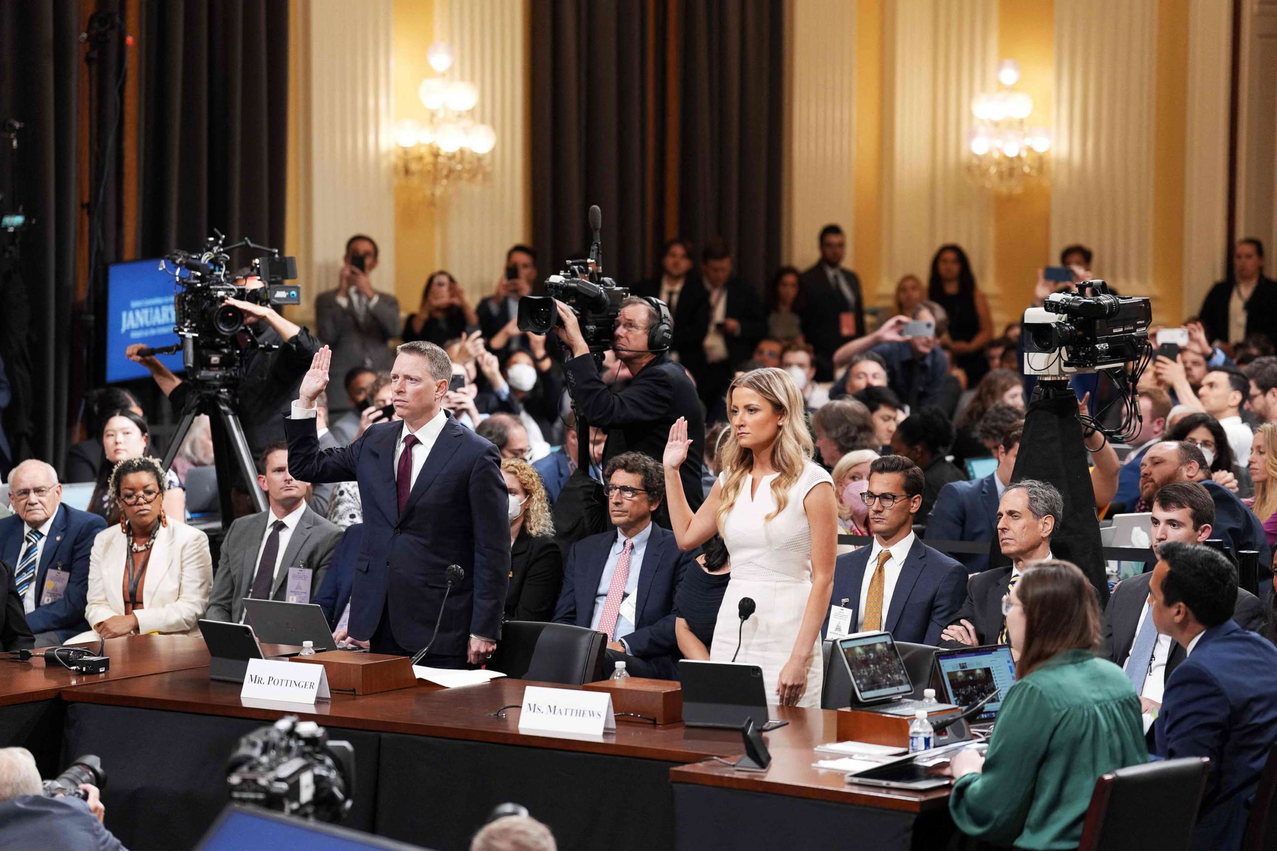 PHOTO: Former National Security Council member Matthew Pottinger and former Deputy White House Press Secretary Sarah Matthews are sworn in during a hearing by the House Select Committee in Washington, D.C., on July 21, 2022.