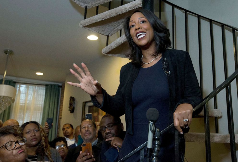 PHOTO: Maya Rockeymoore Cummings speaks to the media and supporters from the stairs of her home announcing her campaign for her late husband's congressional seat, in Baltimore, Nov. 12, 2019.