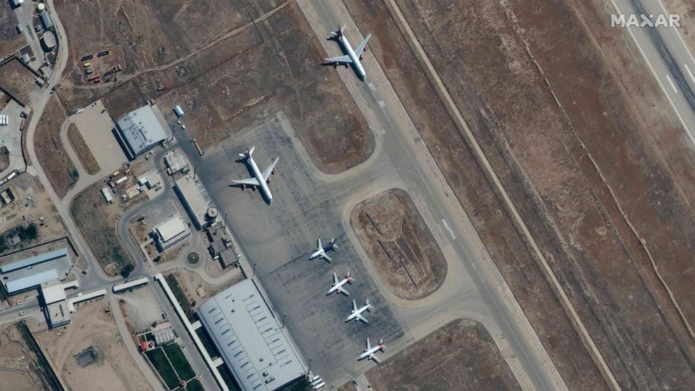 PHOTO: This handout satellite image released by Maxar Technologies shows grounded commercial planes at the the Mazar-i-Sharif airport in northern Afghanistan on Sept. 3, 2021.