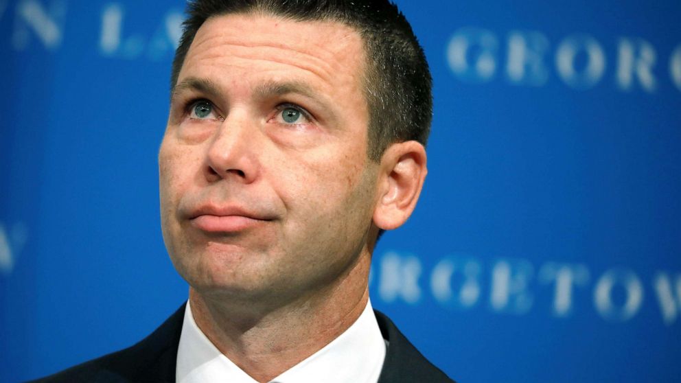 PHOTO: Acting Department of Homeland Security (DHS) Secretary Kevin McAleenan reacts while demonstrators interrupt his remarks at the Migration Policy Institute annual Immigration Law and Policy Conference in Washington D.C., Oct. 7, 2019.