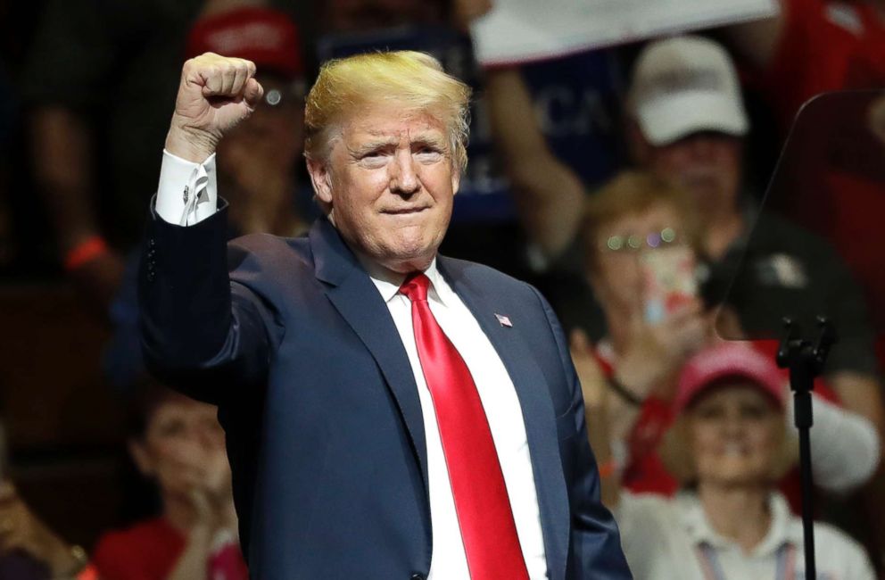 PHOTO: President Donald Trump acknowledges the crowd's applause during a Republican campaign rally, May 10, 2018, in Elkhart, Ind. 