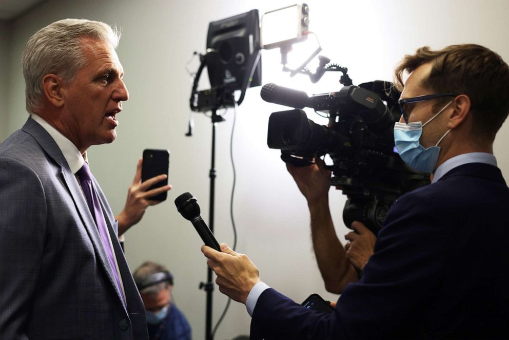 House Minority Leader Rep. Kevin McCarthy, R-Calif., speaks to members of the press as he arrives at a House Republican Conference meeting at the U.S. Capitol on July 28, 2021 in Washington.