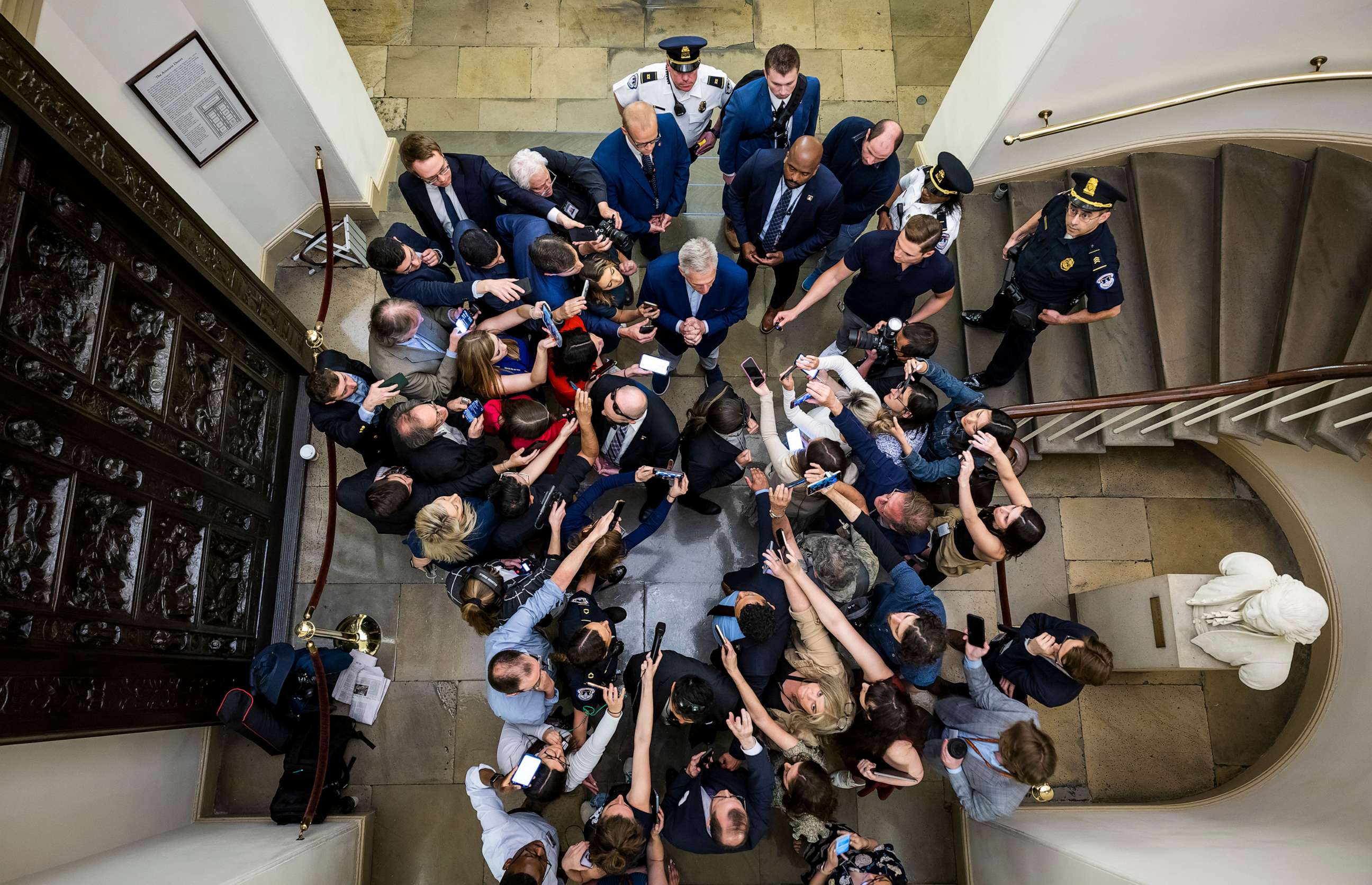 PHOTO: Speaker of the House Kevin McCarthy speaks to reporters about negotiations with the White House over the debt limit as he arrives to the U.S. Capitol, May 26 2023, in Washington, D.C.