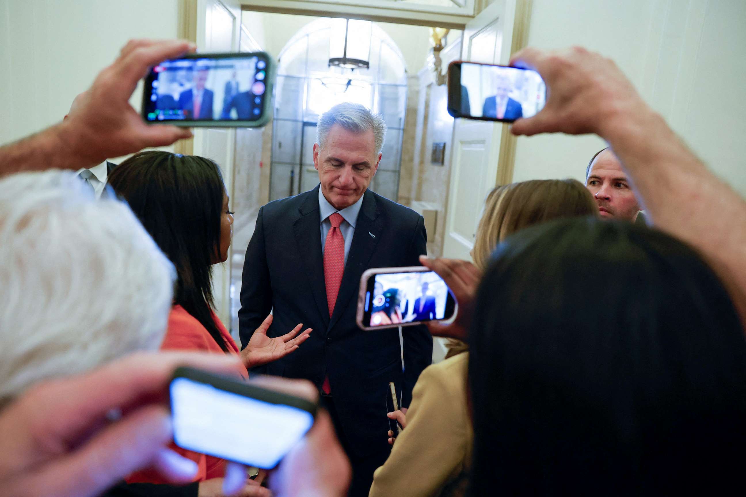 PHOTO: House Speaker Kevin McCarthy speaks with reporters as he arrives for the day in the midst of ongoing negotiations seeking a deal to raise the United States' debt ceiling, at the U.S. Capitol in Washington, D.C., May 24, 2023.