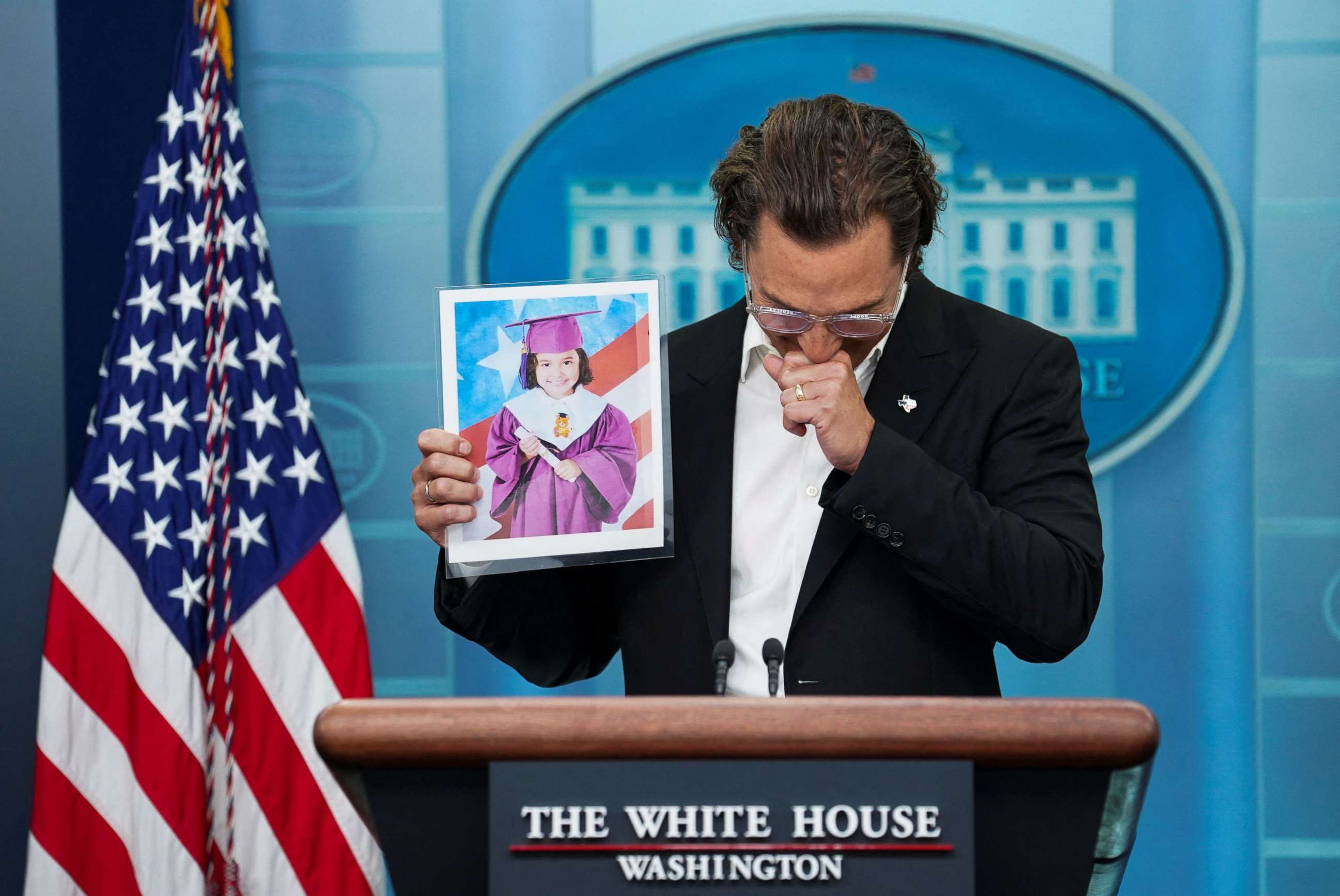 PHOTO: Matthew McConaughey becomes emotional as he holds up a picture of 10-year-old victim Alithia Ramirez as he speaks to reporters about the school shooting in Uvalde during a press briefing at the White House in Washington, June 7, 2022.