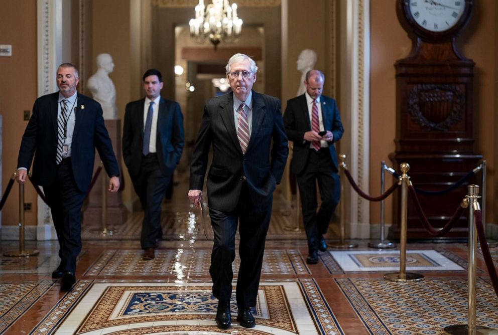 PHOTO: Senate Minority Leader Mitch McConnell walks to the chamber the morning after an 18-year-old gunman opened fire at a Texas elementary school, killing at least 19 children, on Capitol Hill in Washington , DC, May 25, 2022.