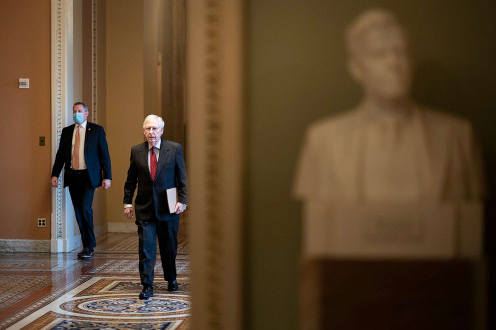 PHOTO: Senate Minority Leader Mitch McConnell walks to the Senate Chamber at the Capitol, Dec. 2, 2021. 