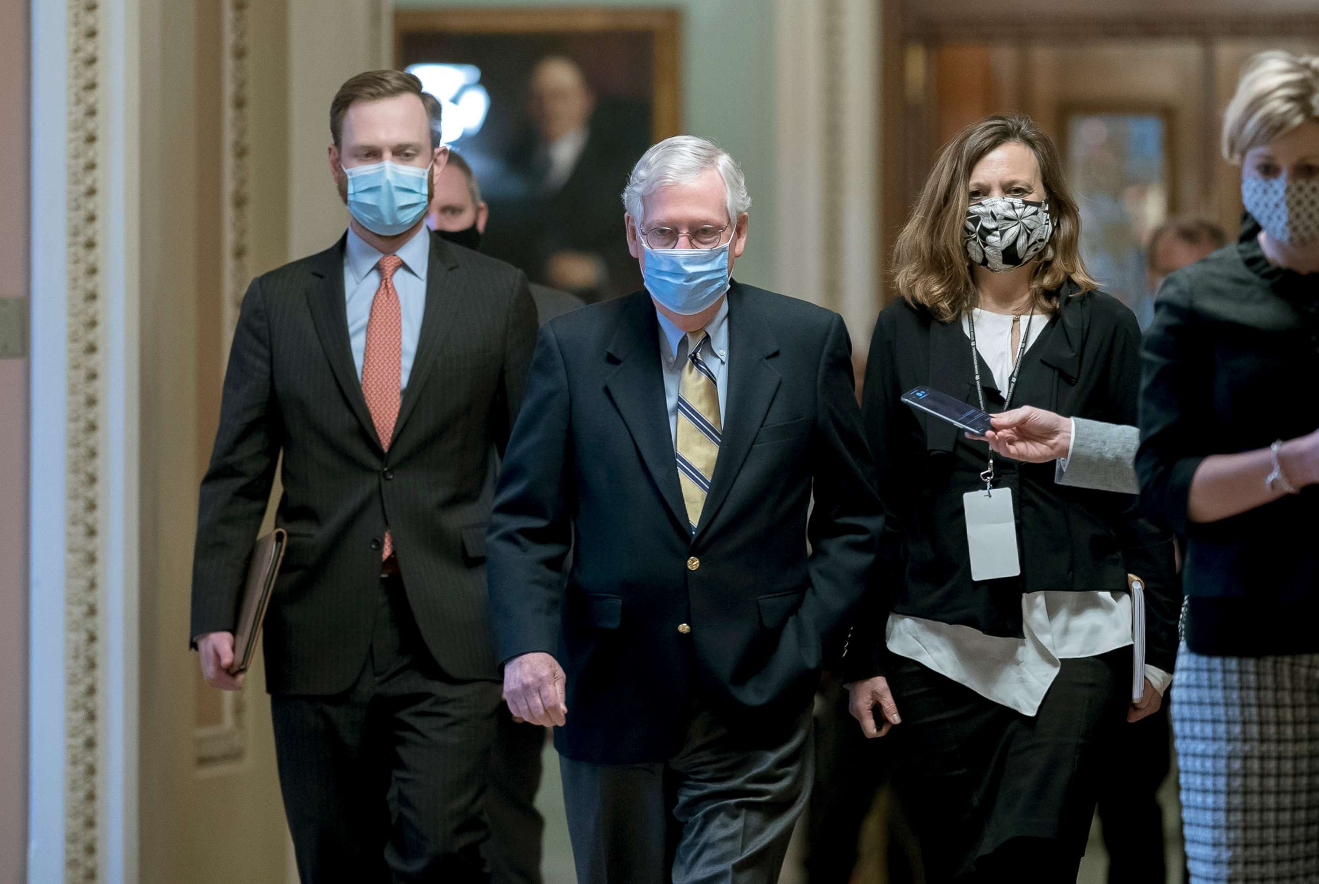 PHOTO: Senate Minority Leader Mitch McConnell leaves the chamber after the Senate voted not guilty in the impeachment trial of former President Donald Trump, at the Capitol in Washington, D.C., Feb. 13, 2021.