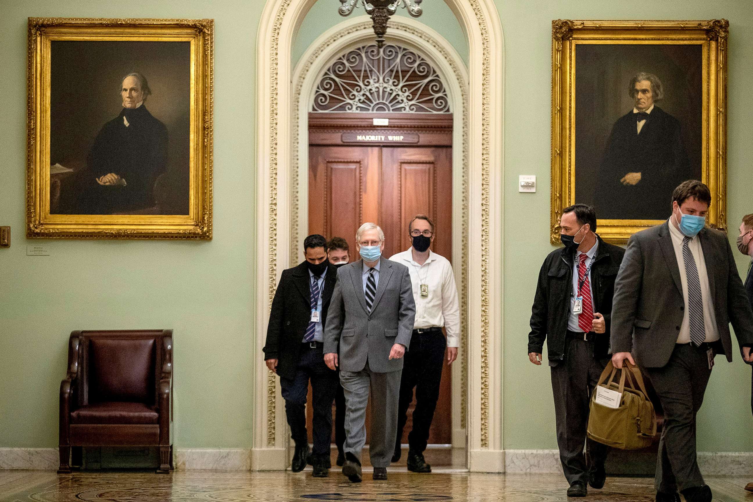 PHOTO: Senate Majority Leader Mitch McConnell walks to the Senate Floor in the US Capitol on Dec. 16, 2020 in Washington. Leader McConnell has said that the Senate won't recess for the holidays until there is a COVID 19 relief package.