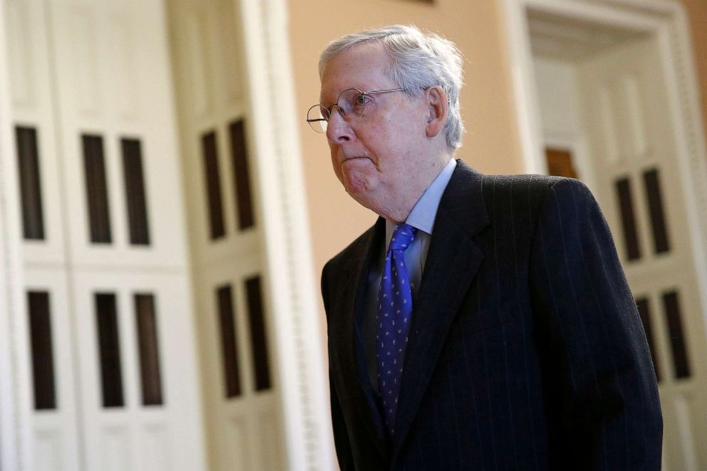 PHOTO: Senate Majority Leader Mitch McConnell walks to the Senate chamber on Capitol Hill in Washington, March 24, 2020.