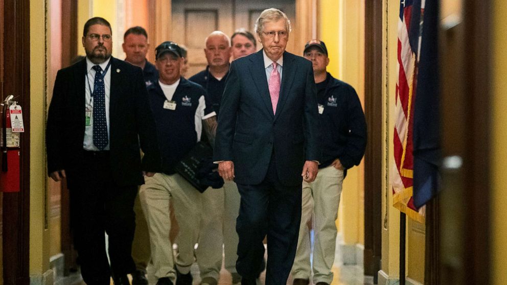 PHOTO: Senate Majority Leader Mitch McConnell walks with Sept. 11 first responders John Feal, second from left, Ret. Lt. Michael O'Connell, back right, and other first responders, following their meeting on Capitol Hill in Washington, June 25, 2019.