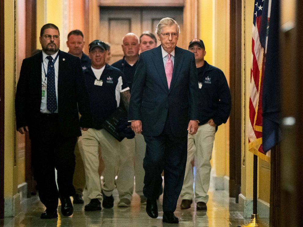PHOTO: Senate Majority Leader Mitch McConnell walks with Sept. 11 first responders John Feal, second from left, Ret. Lt. Michael OConnell, back right, and other first responders, following their meeting on Capitol Hill in Washington, June 25, 2019.