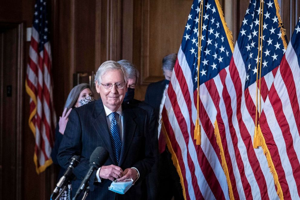 PHOTO: Senate Majority Leader Mitch McConnell arrives to a news conference following a weekly meeting with the Senate Republican caucus at the U.S. Capitol on Dec. 8, 2020, in Washington, DC.