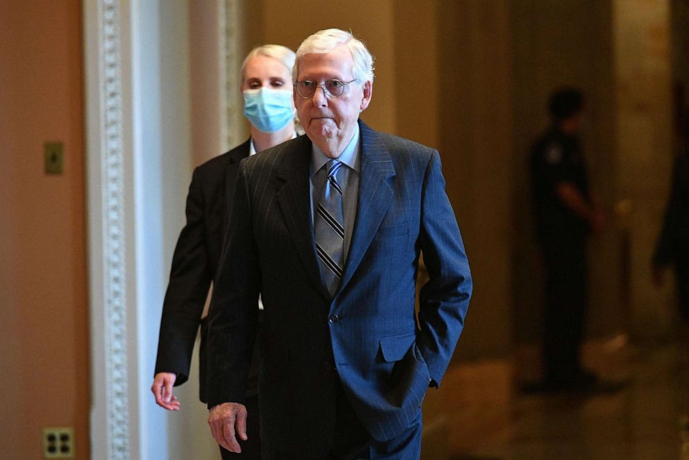 PHOTO: Senate Minority Leader Mitch McConnell heads to the Senate chamber to cast his vote at the US Capitol before a vote on the passage of a massive infrastructure plan in Washington on Aug. 10, 2021.
