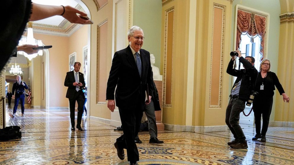 PHOTO: Senate Majority Leader Mitch McConnell arrives during negotiations on a coronavirus disease (COVID-19) relief package on Capitol in Washington, March 23, 2020.