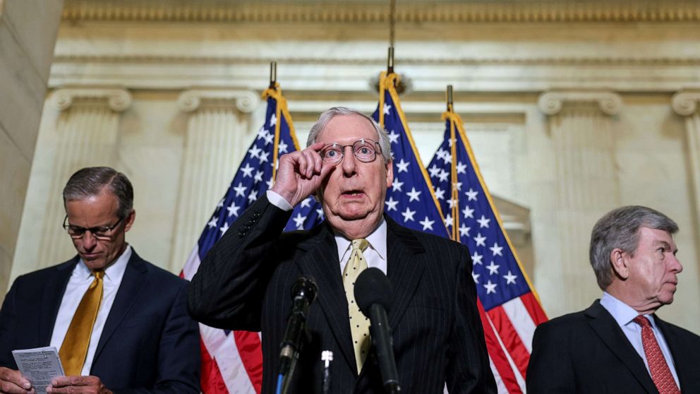 PHOTO: Senate Minority Leader Mitch McConnell, flanked by Senators John Thune and Roy Blunt, speaks to reporters after the Senate Republican lunch on Capitol Hill in Washington, D.C., May 18, 2021.