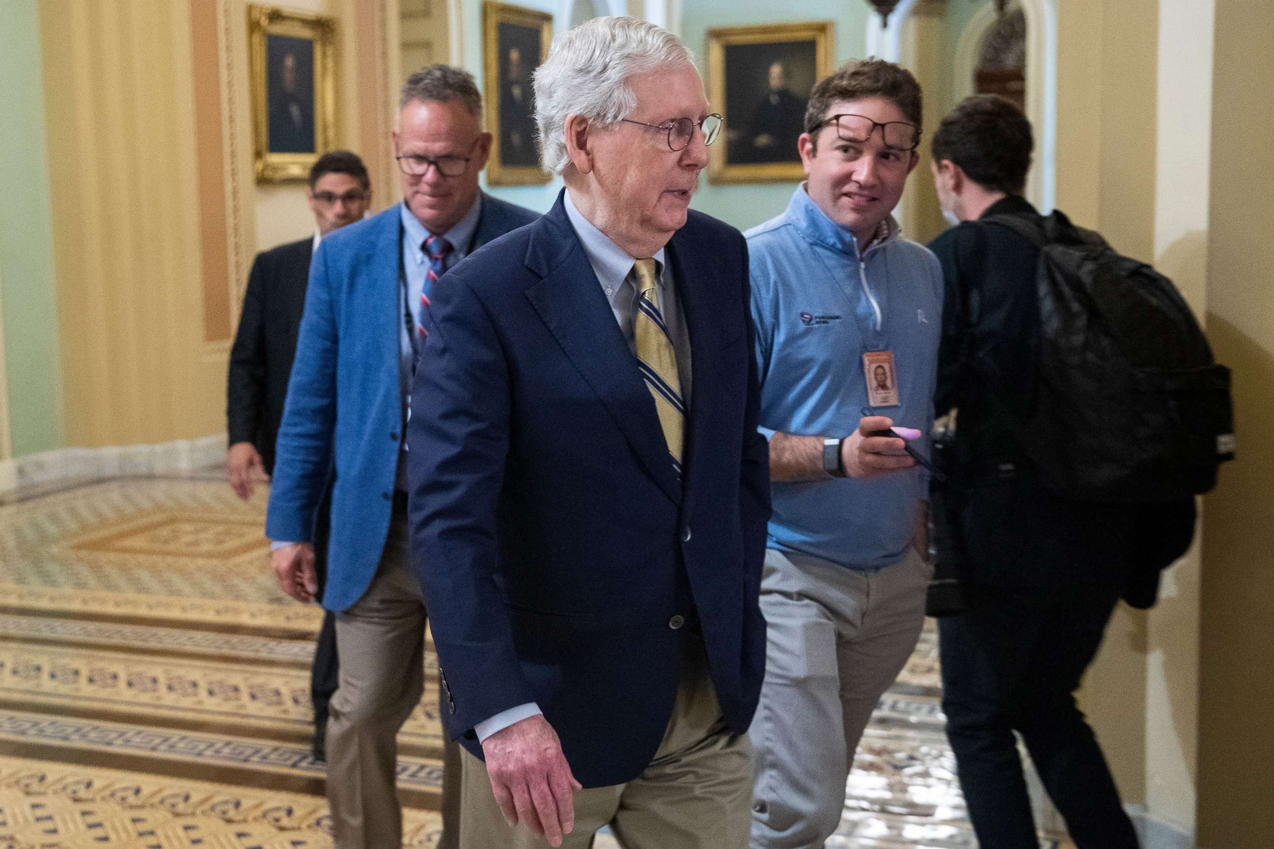 PHOTO: Senate Minority Leader Mitch McConnell responds to a question from the journalists as he walks to his office in the US Capitol in Washington, May 28, 2021.
